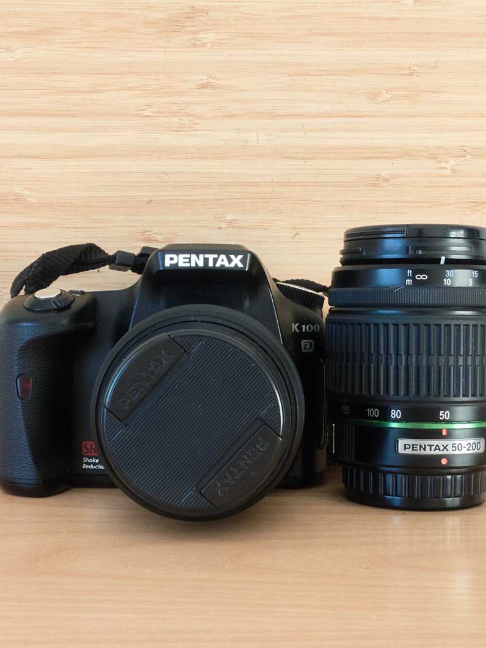 Pentax K100D 6.1MP Digital SLR Camera Kit with 18-55mm and 50-200mm Lenses
